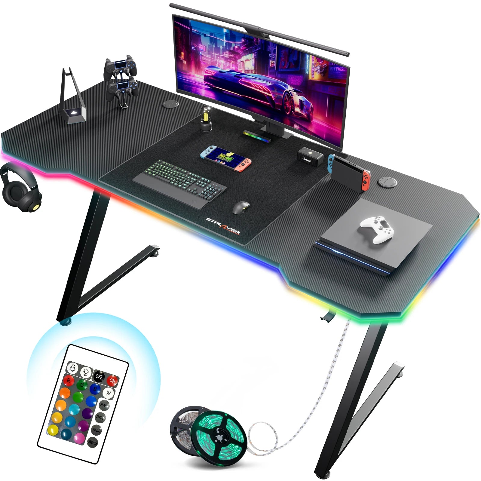 Escritorio gaming 120×60 cm con superficie tipo fibra de carbono, iluminación LED y enchufe integrado – estructura metálica en forma de Z color negro